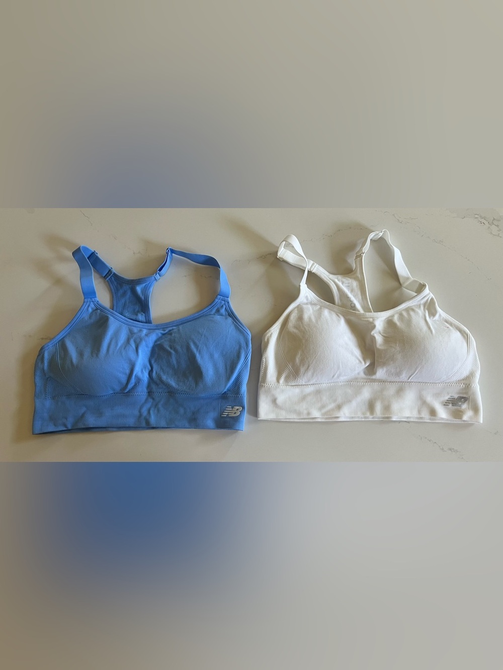 Set 2 New Balance Light Blue Sports Bra + White Seamless Bralette
